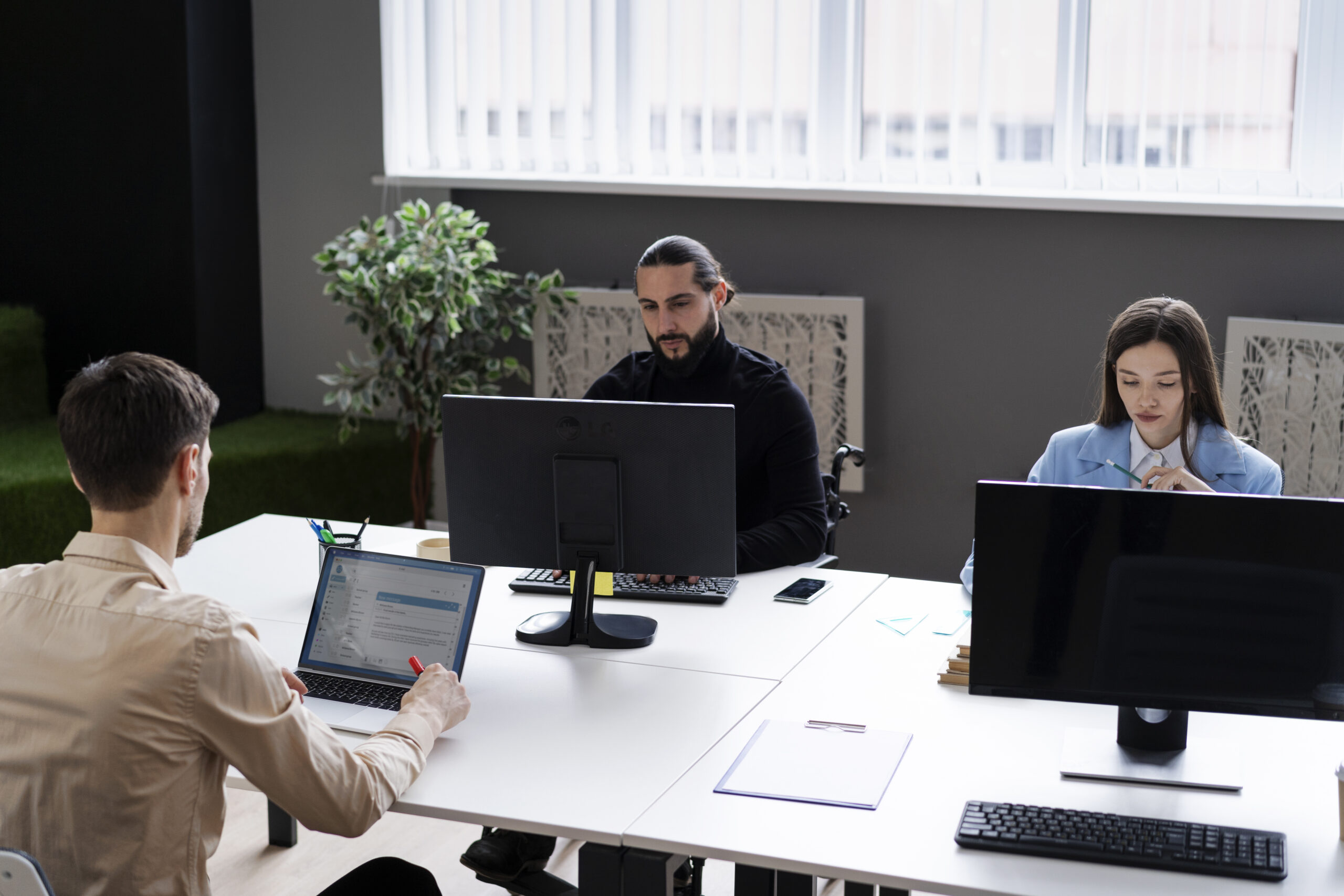 medium shot people working with computers